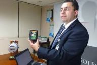 CFE official with card