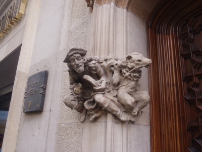 which should not be confused with the guy playing a drum,  with his  ...  ______ ... on a leash  ( ??? )