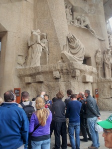 people still stand in lines ...    unaware of some of the world's finest 3-D dramas  pass by  (overhead). 